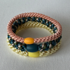 Three KKNEKKI woven hair ties together