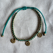 Bambi Brass Anklet in teal waxed cord with brass beads and charms