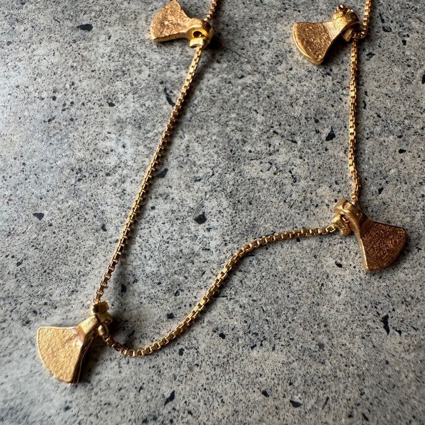 Close-up of the hanging charms on the Bali Anklet