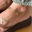 Bali Anklet worn on the ankle with a platform flip flop