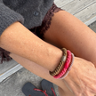 KKNEKKI hair ties stacked on the wrist