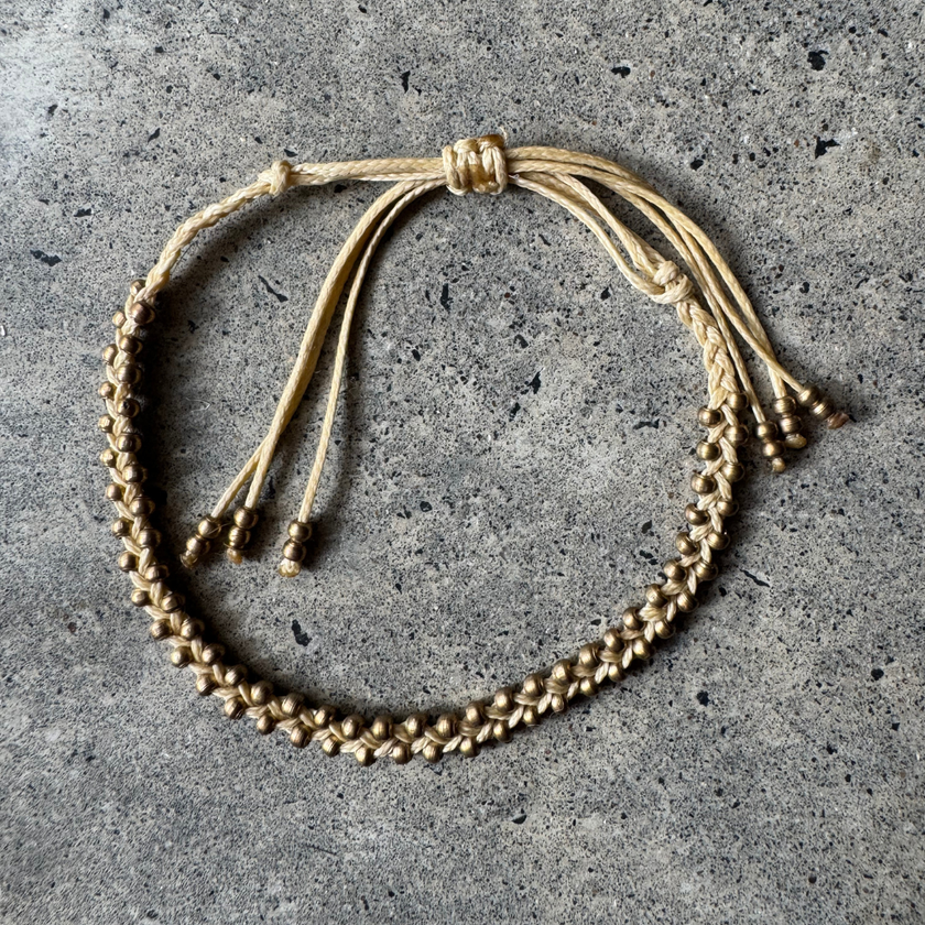 Nav Macrame Bracelet showing the adjustable cord ties