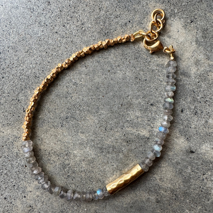 Munnar Labradorite Bracelet with labradorite and gold-plated beads, laid flat