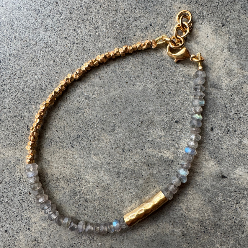 Munnar Labradorite Bracelet with labradorite and gold-plated beads, laid flat