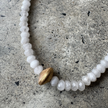 Close-up of the white onyx beads on the Cyrus Bracelet